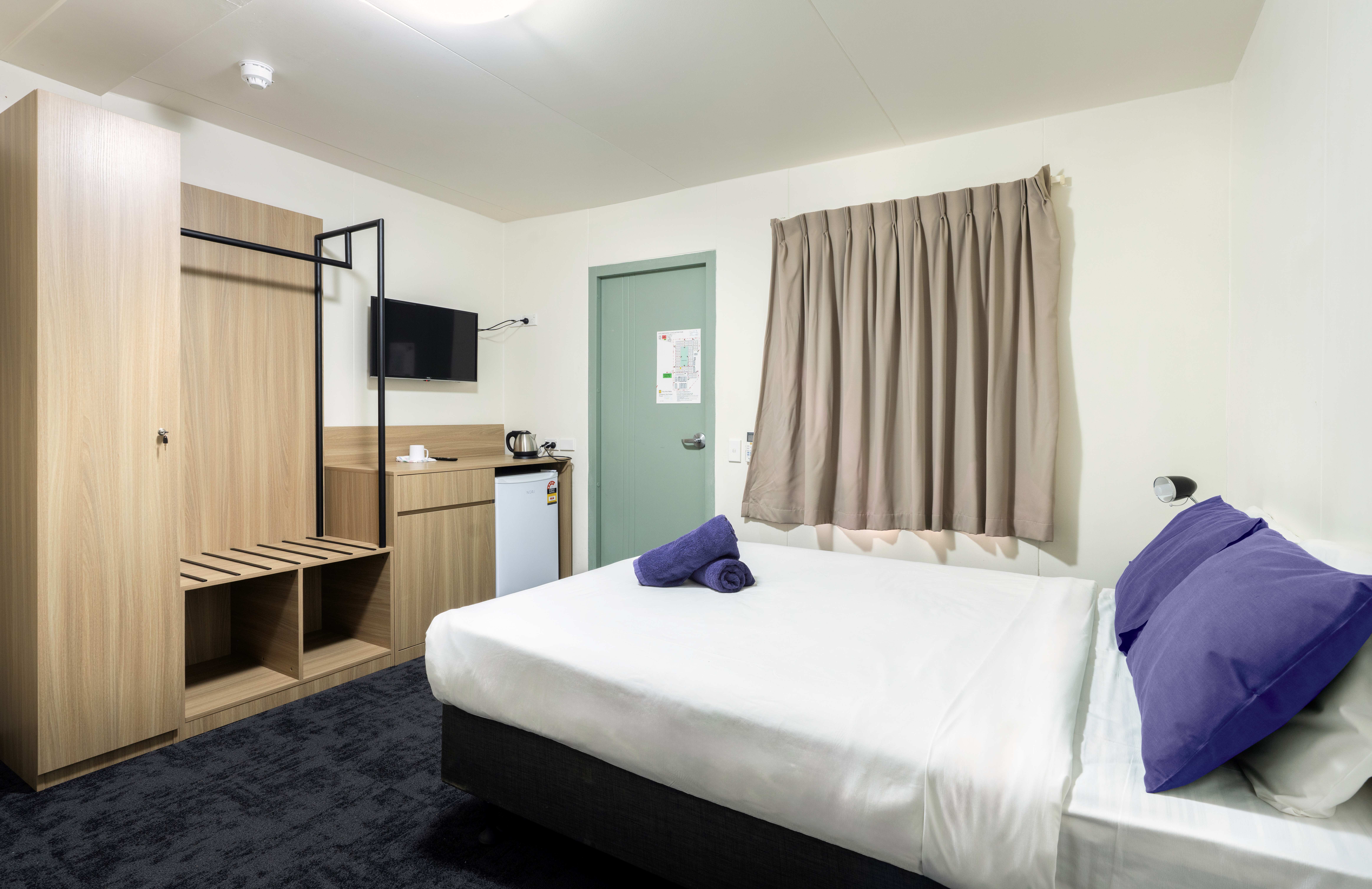 image of a cozy reading nook with a bestselling book on a side table