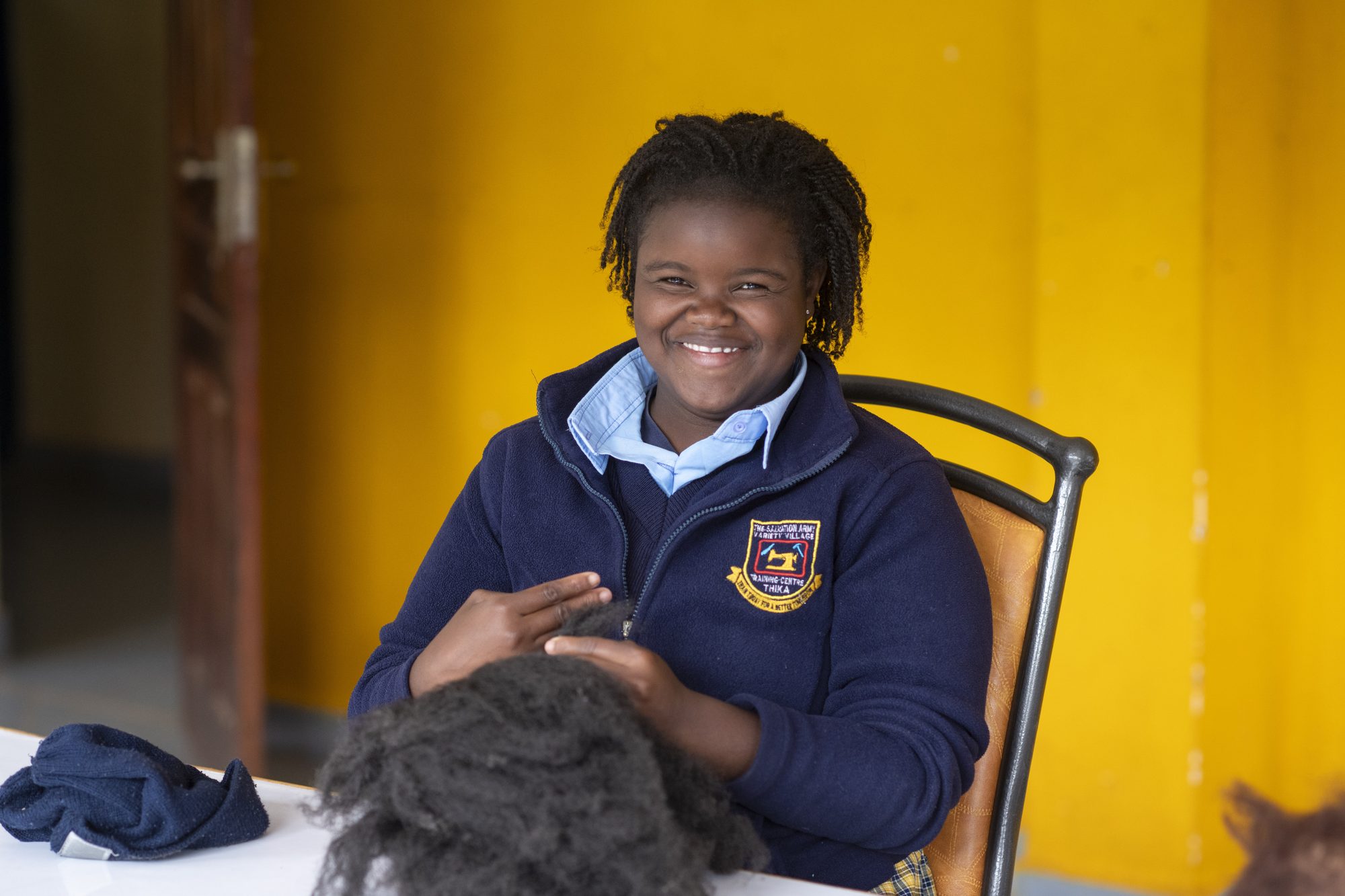 Lachende student van het Marianne Center