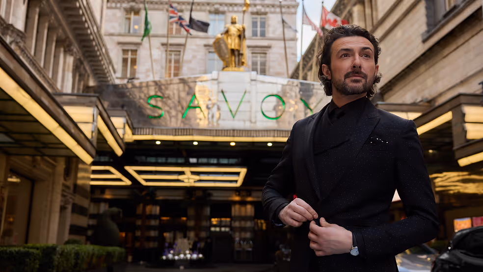 Hosted by Alex Zane, broadcaster and storyteller, whose wit and curiosity draw out the heart of every guest. With his signature mix of insight and charm, he captures the spirit of The Savoy,  brilliant, engaging, and just a little theatrical.