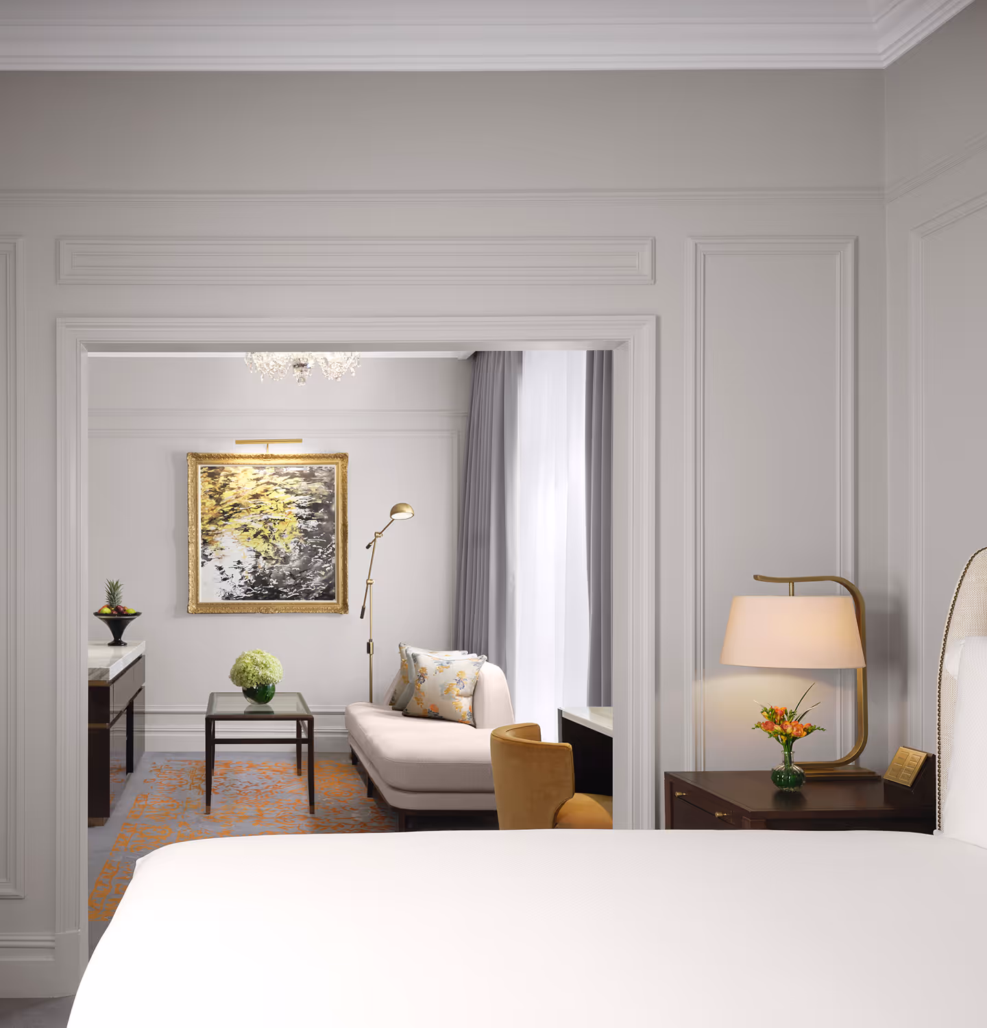 A graceful blend of bedroom comfort and living space.