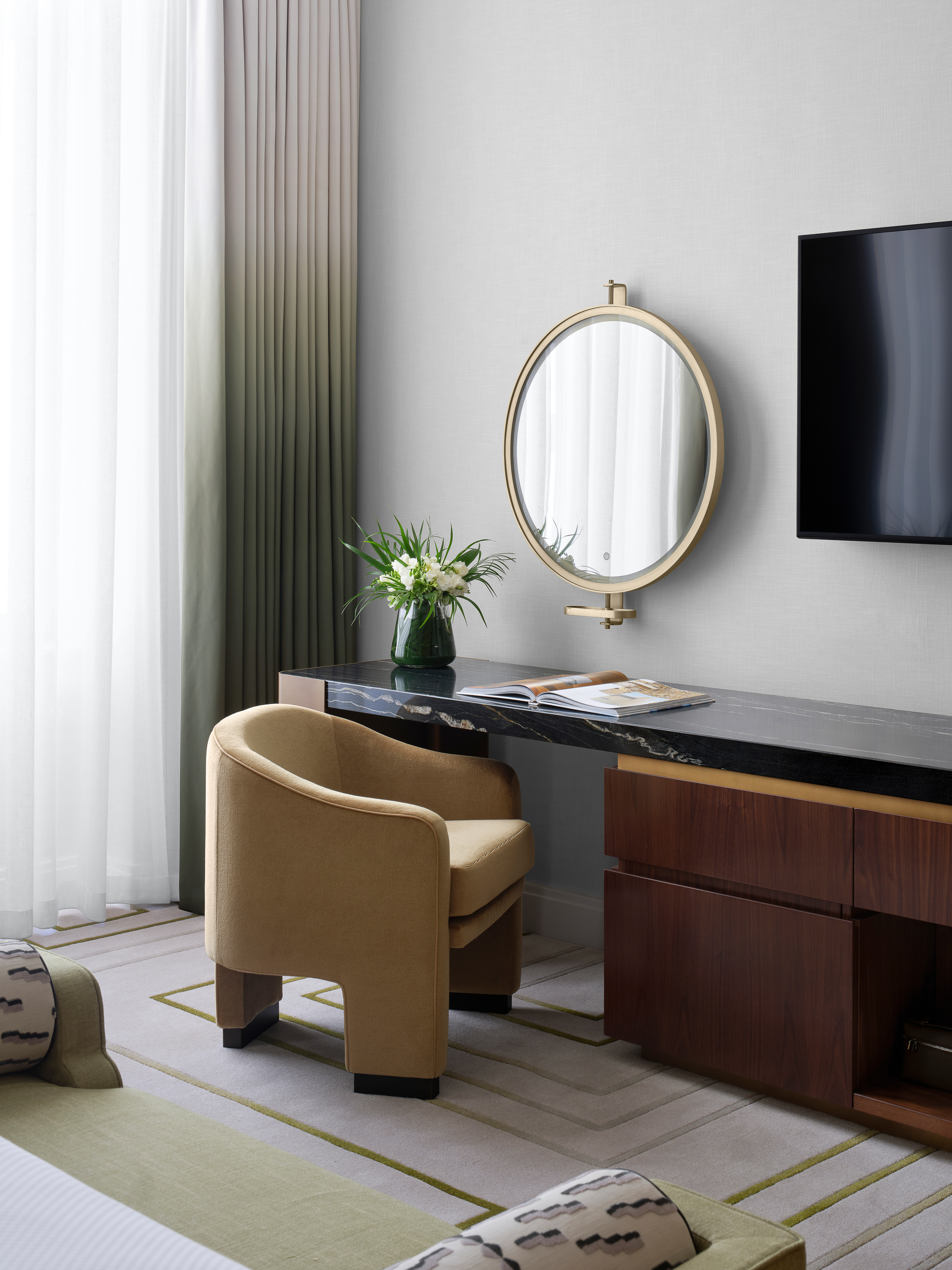 A separate sitting room, king bedroom and dressing space give our one bedroom suites real structure, with Edwardian or Art Deco detailing shaping each room. Light carries through and the marble bathrooms bring a sense of grandeur. It's a layout that works for longer stays or focused working days.