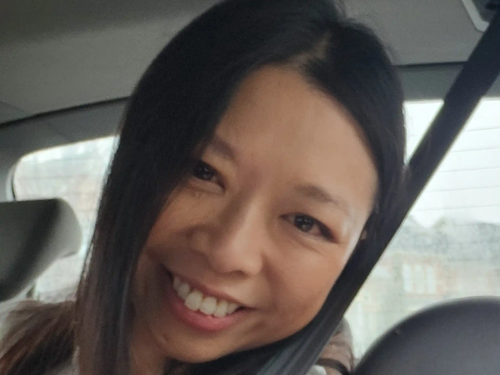 Teresa smiling facing forward