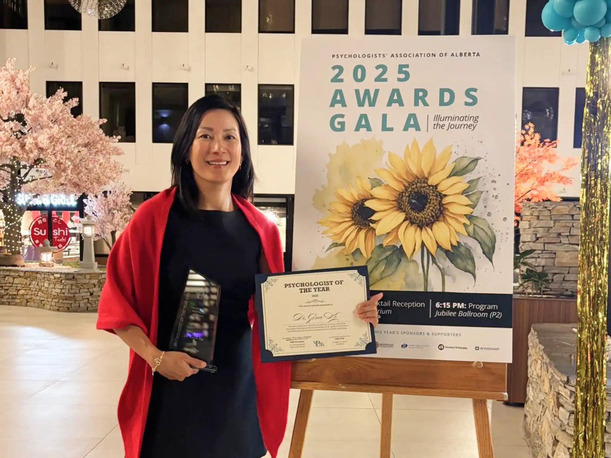 Dr. Gina Ko receiving award for 2025 Psychologist of the year