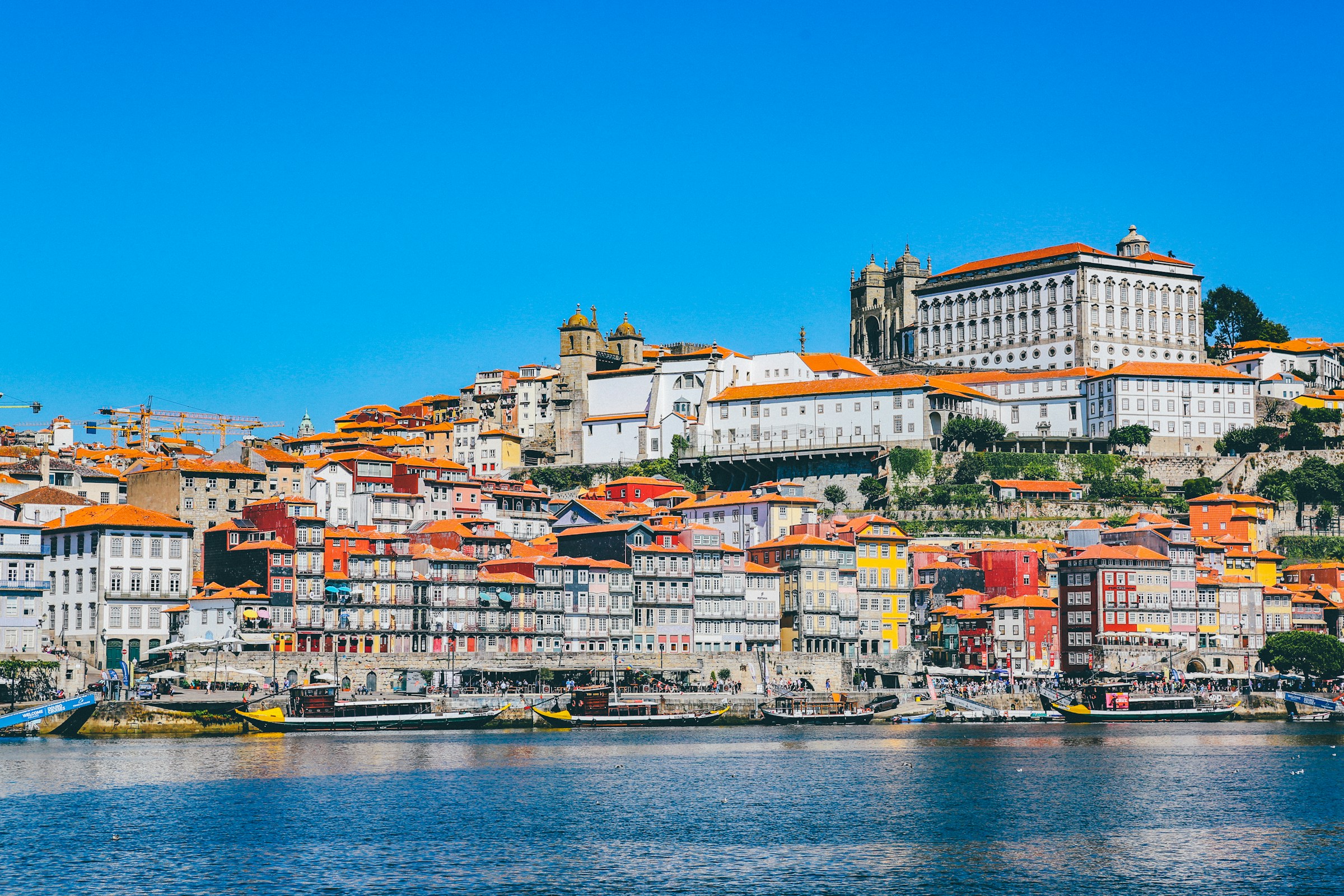 Porto's Ribeira district along the Douro under a blue sky, Portugal