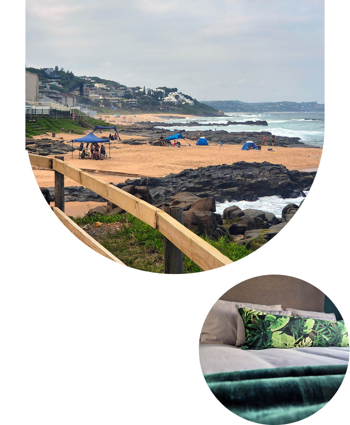 Sandy beach with rocky areas, blue tents, and people under a gray cloudy sky near a coastal town.