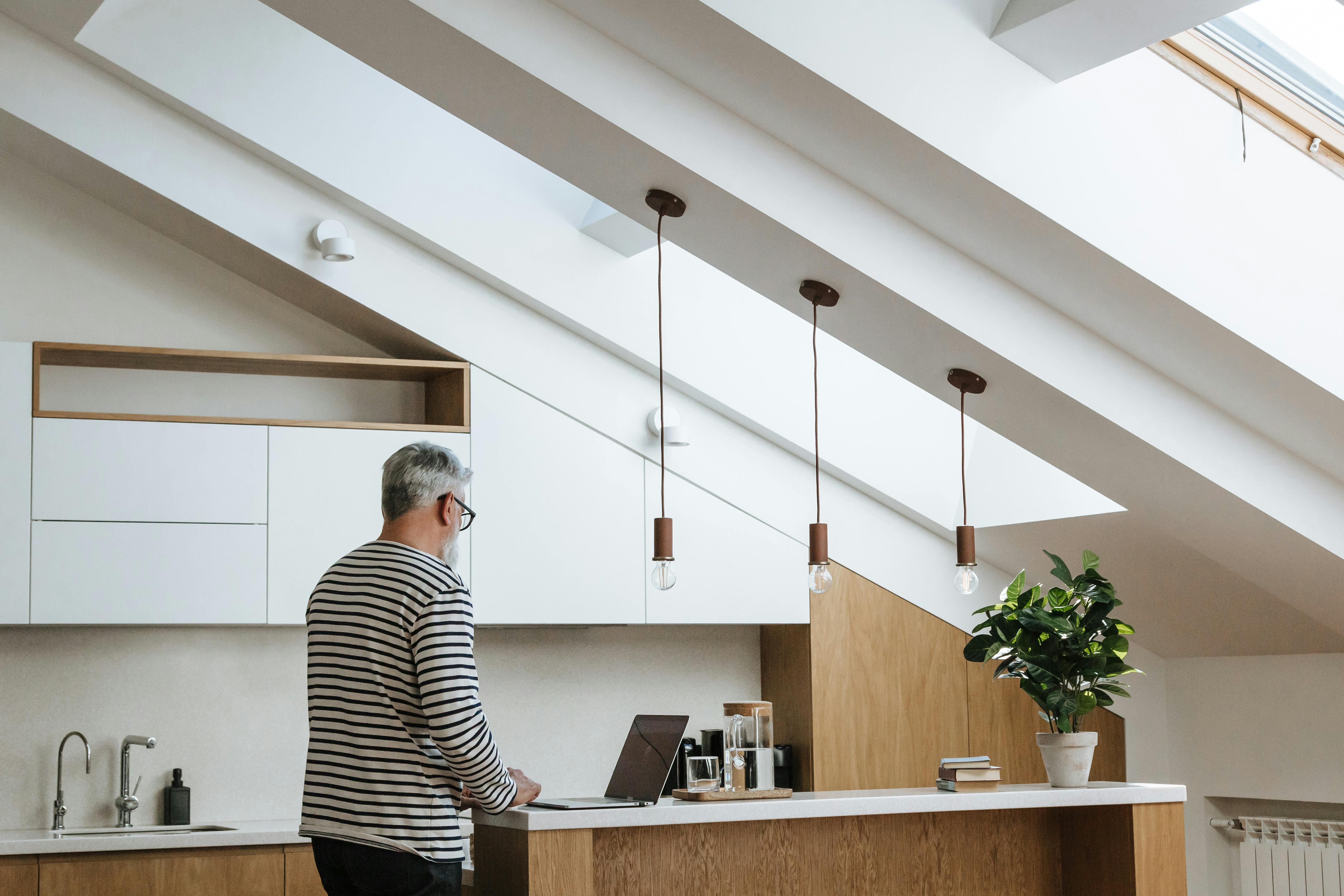 A View From Behind of a Senior Male Adult Standing and ...