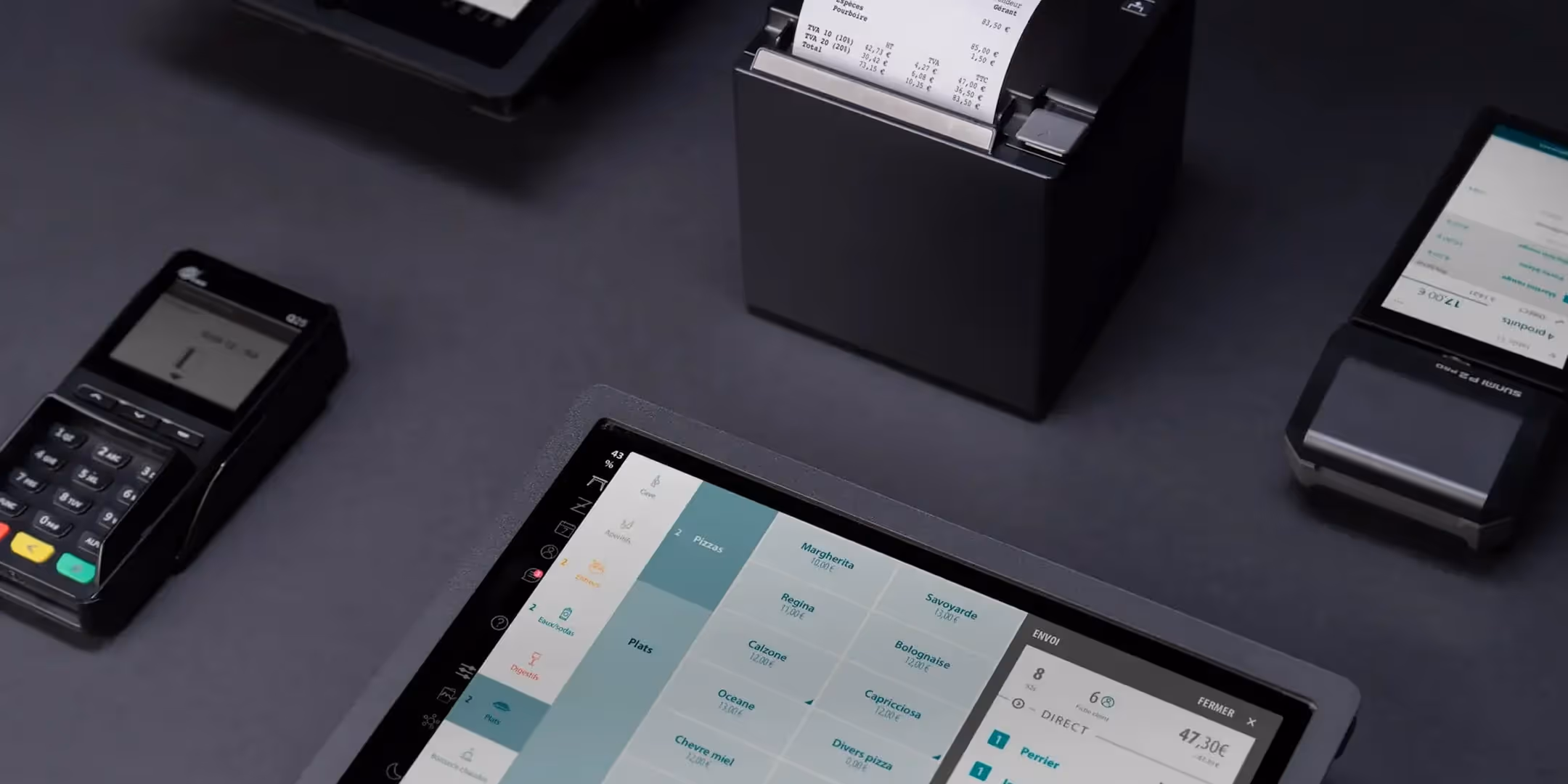 Terminal de paiement avec écran tactile affichant un menu de pizzas et une imprimante thermique avec ticket.