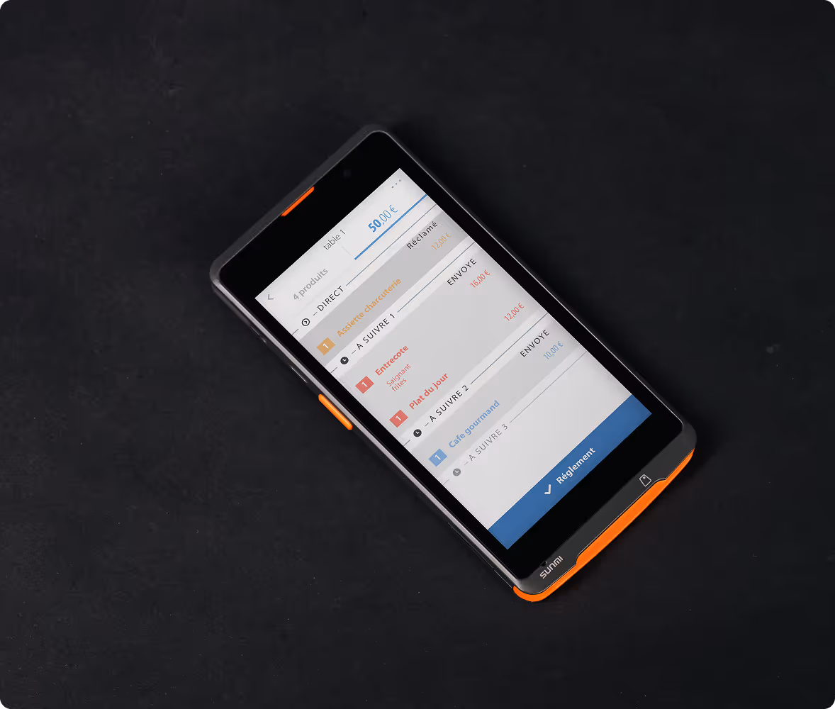 Tablette affichant une application de commande avec liste d’articles et montant total de 50 euros.