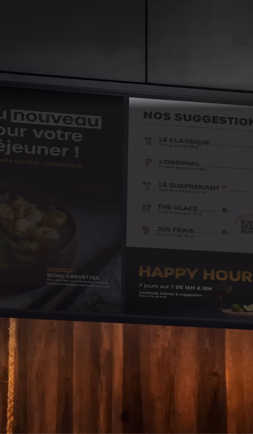 Menu restaurant affichant des suggestions de boissons dont Le Classique, L’Original, Le Surprenant, Thé Glacé, Jus Frais, et une promotion Happy Hour de 16h à 18h.