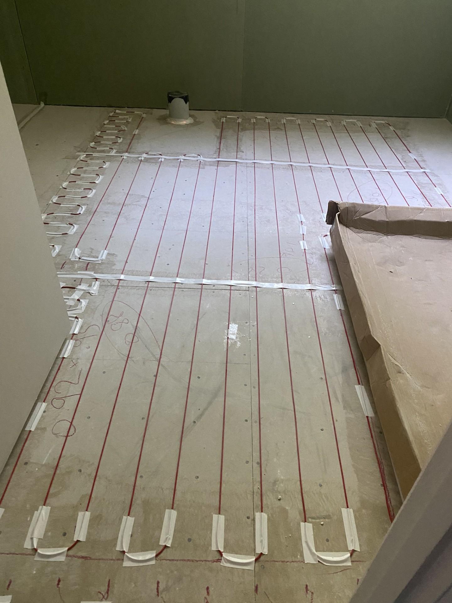 Open blue drawers with soft warm lighting from above create a sleek, modern look. The image conveys an organized and minimalist tone.