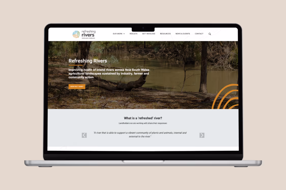 Laptop displaying the Refreshing Rivers website homepage with a river image and text about improving inland river health in New South Wales.