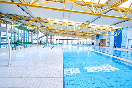 Image of indoor swimming pool and pool deck