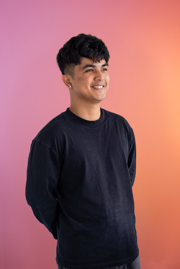 A professional portrait of smiling Russell Sabatin