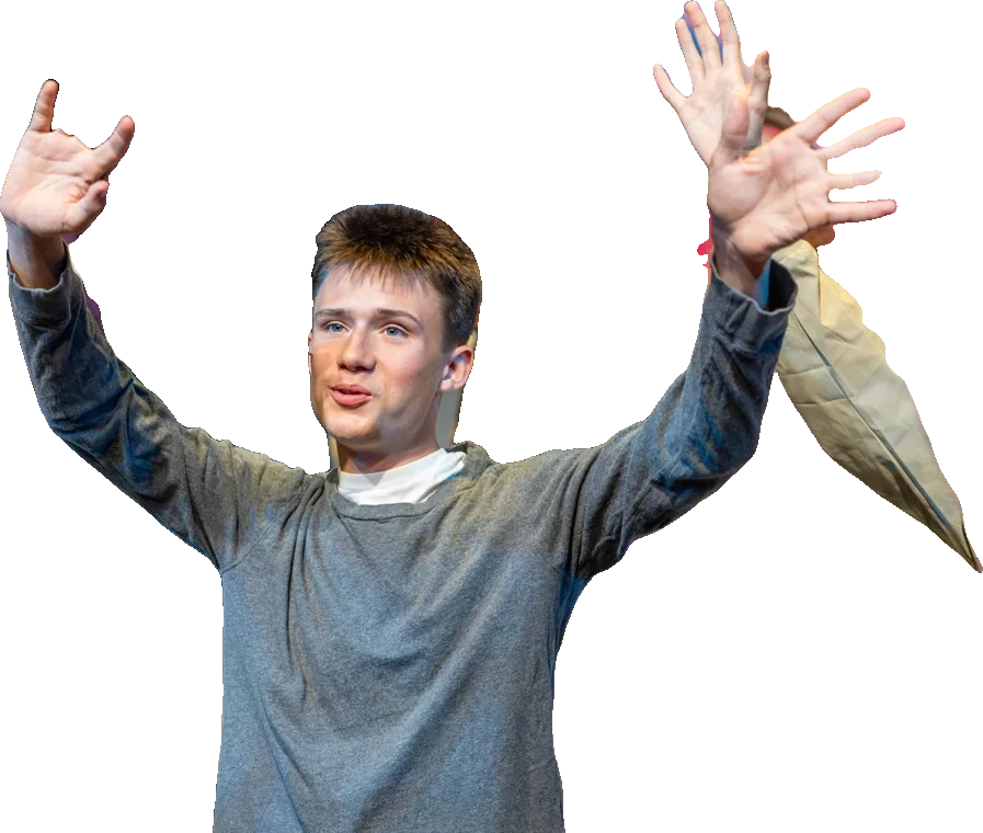 A Tapestry actor cheers with both arms raised in Finding Nemo