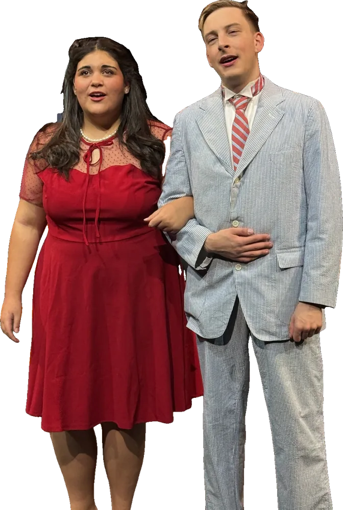 Two Tapestry actors walk arm in arm in Bye Bye Birdie