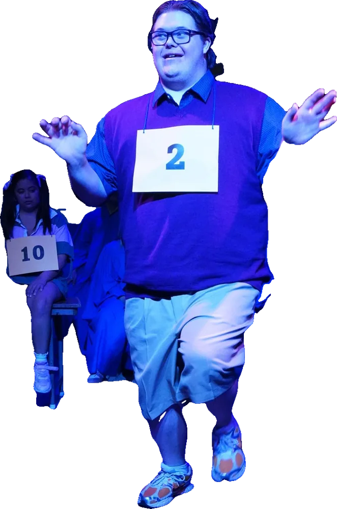A Tapestry actor waves while wearing a contestant number in The 25th Annual Putnam County Spelling Bee