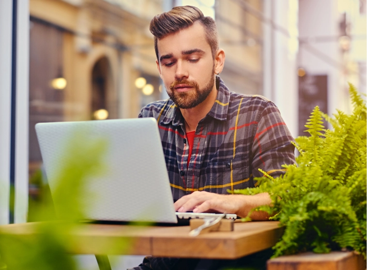 A person working on Laptop
