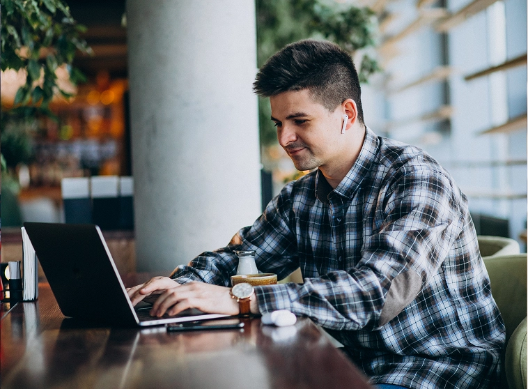 A person working on Laptop