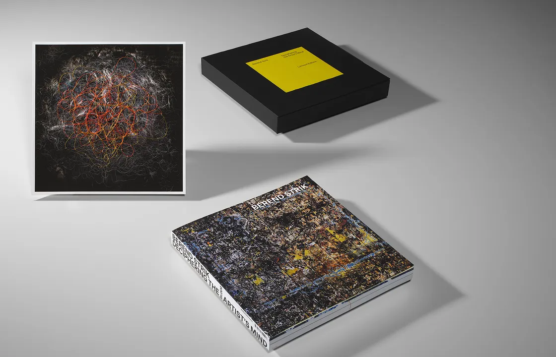 A hardcover book titled 'Berend Strik: Deciphering the Artist’s Mind' with a textured, abstract cover, a black box with a yellow square label, and a square abstract artwork featuring tangled colorful lines on a dark background.