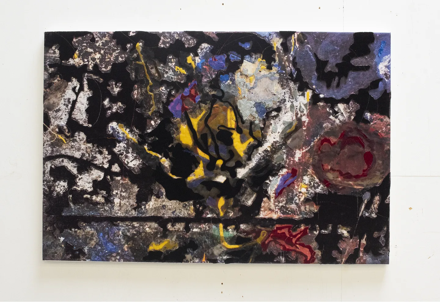 Abstract painting with dark, textured background featuring splashes of yellow, red, blue, and white.