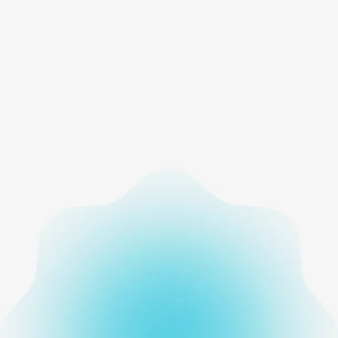 Abstract blue gradient shape with soft edges on a white background.
