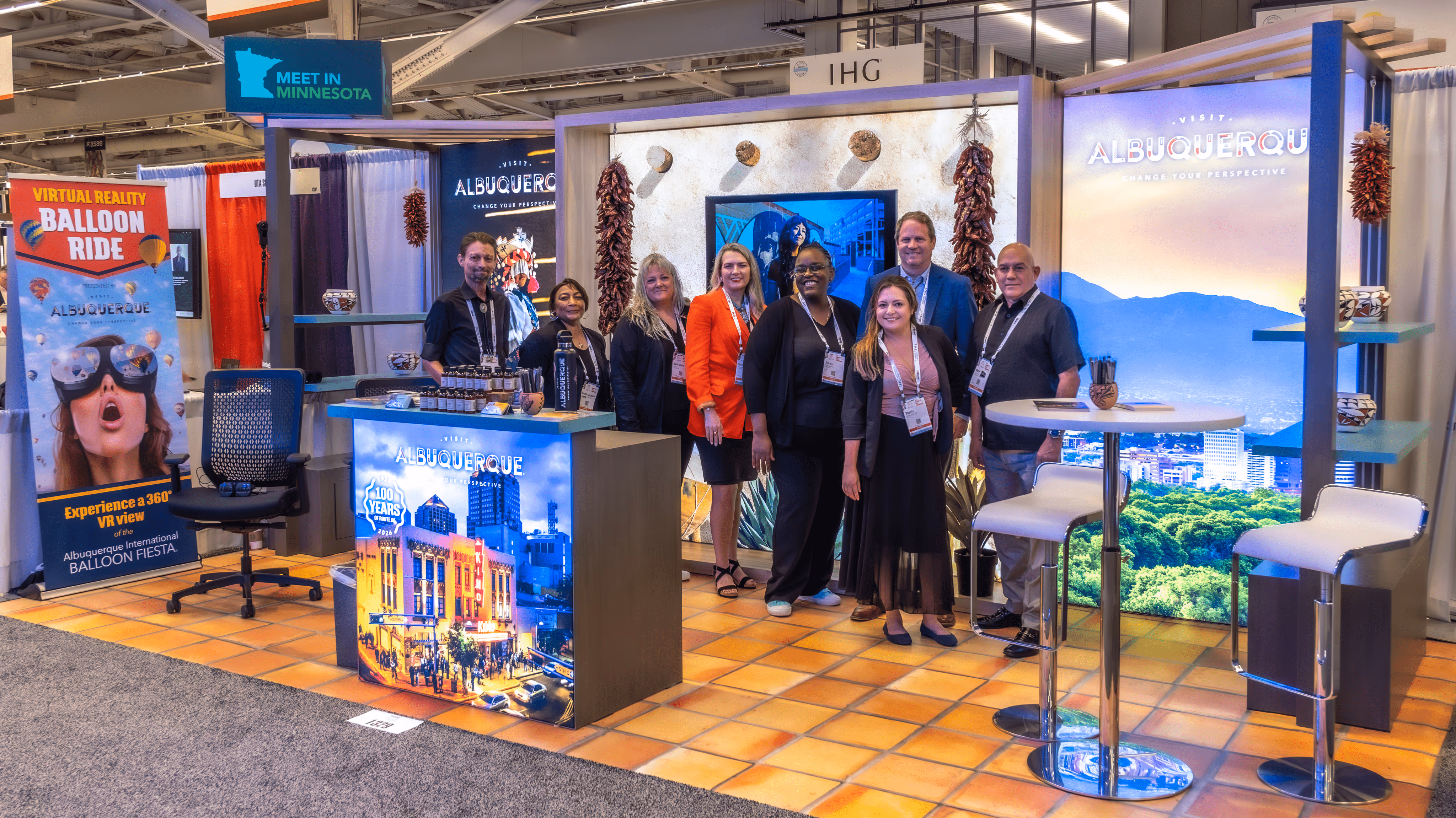 Visit Albuquerque booth welcoming visitors at the show