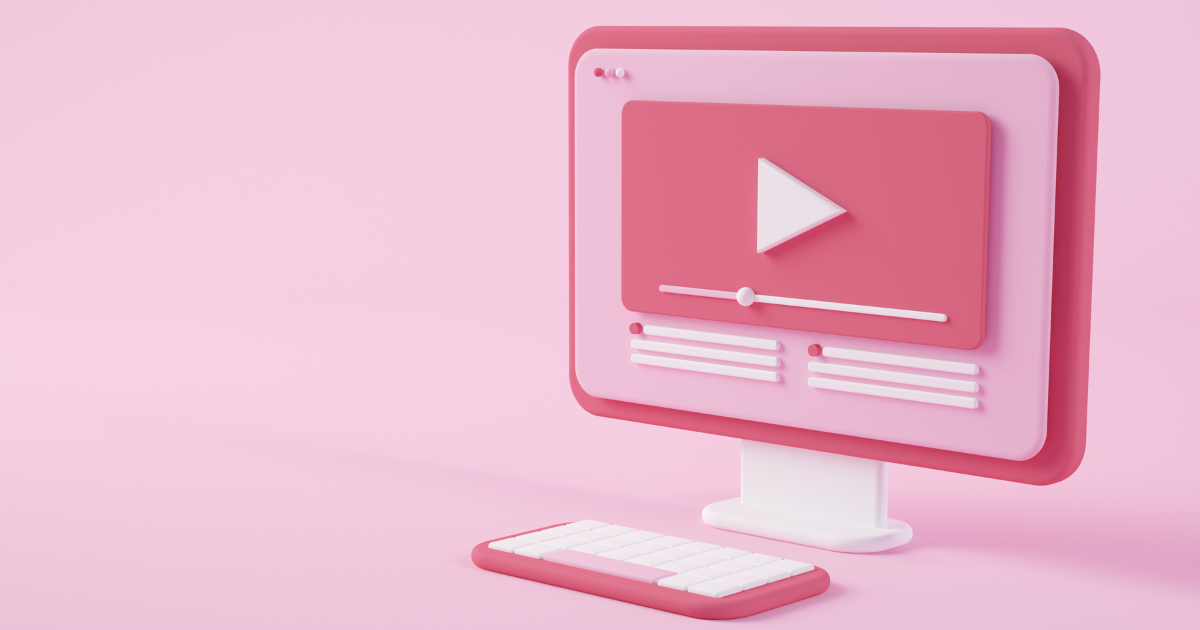 3D pink and white computer monitor and keyboard displaying a video player interface with play button and progress bar on a pink background.