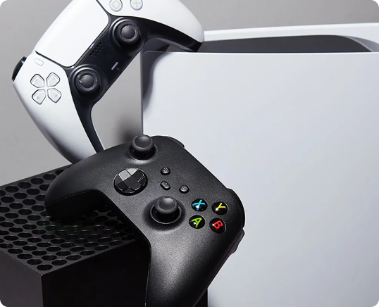 PlayStation and Xbox consoles with controllers for CPR game console repair common issues