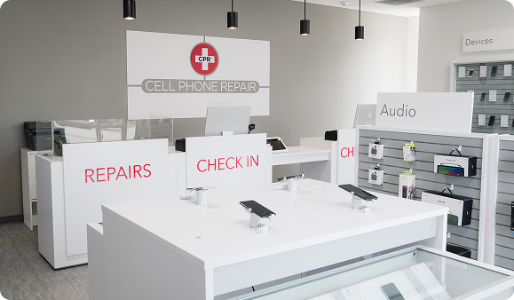 Interior of a CPR Cell Phone Repair store with repair counters and phones on display