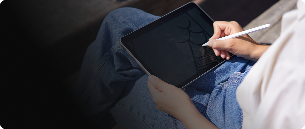 Person using an Apple Pencil on an iPad for CPR common tablet and iPad repair issues
