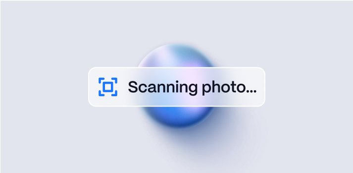 Interface with a translucent button displaying a scanning icon and the text 'Scanning photo...'.