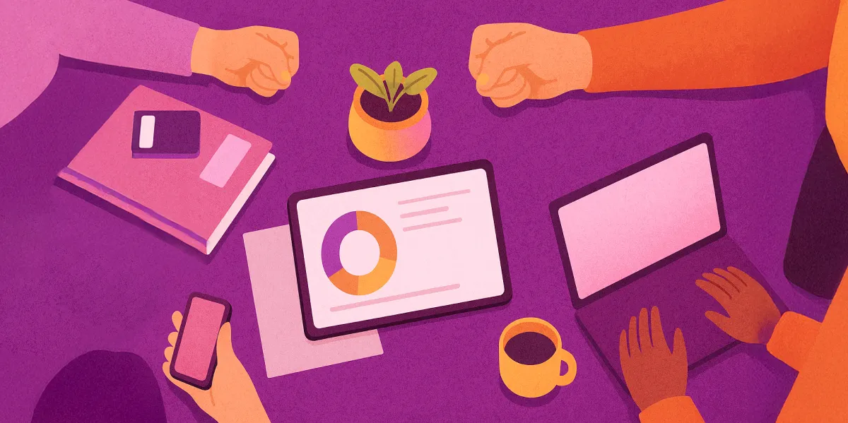 Illustrated overhead view of a desk during a meeting, with hands holding a phone and typing on a laptop, a tablet showing a pie chart, a notebook, coffee cup, and small potted plant.