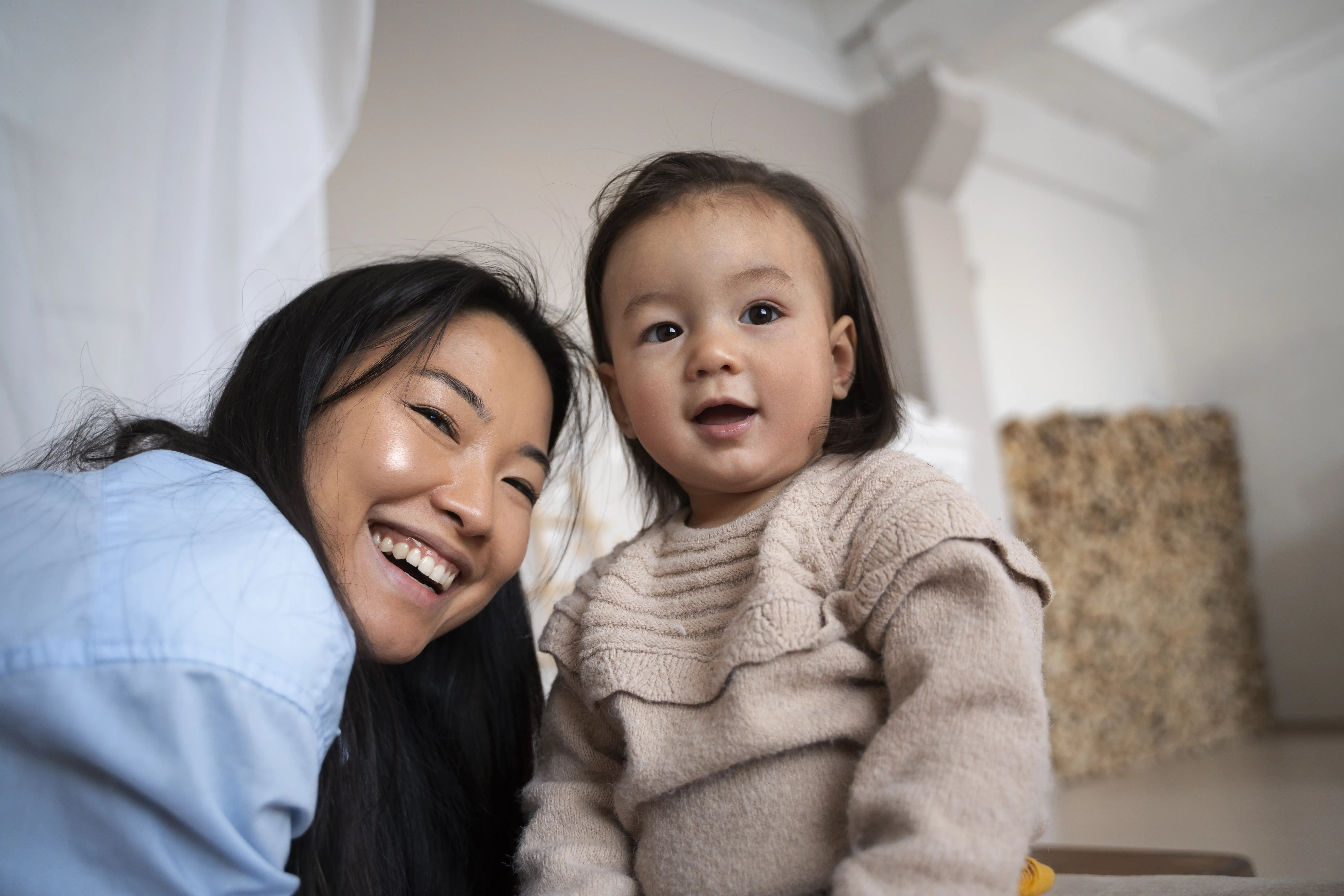 asian-mother-daughter-spending-time-together-home