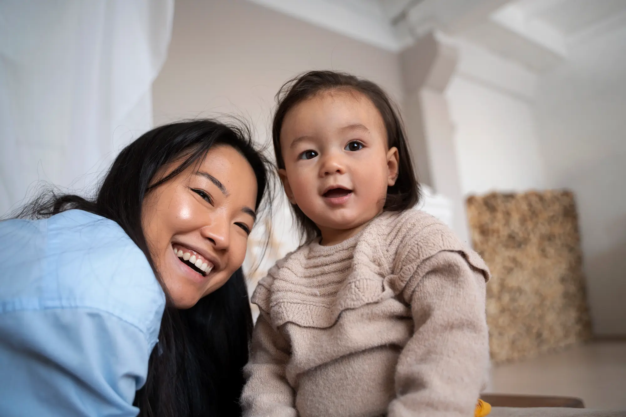 asian-mother-daughter-spending-time-together-home