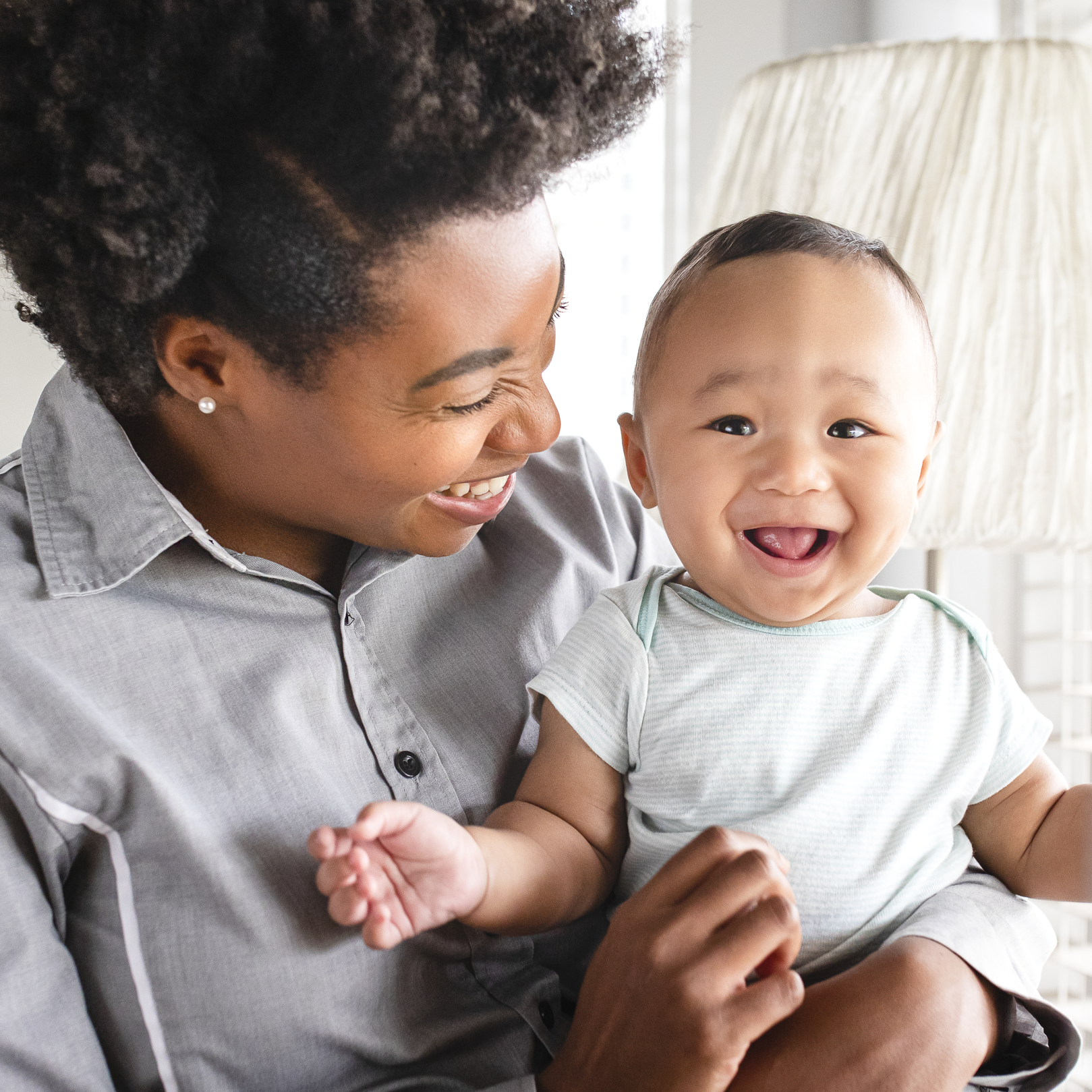 African american mother looking her son smiling