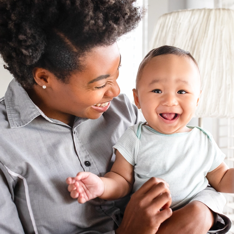 mother looking her son smiling 