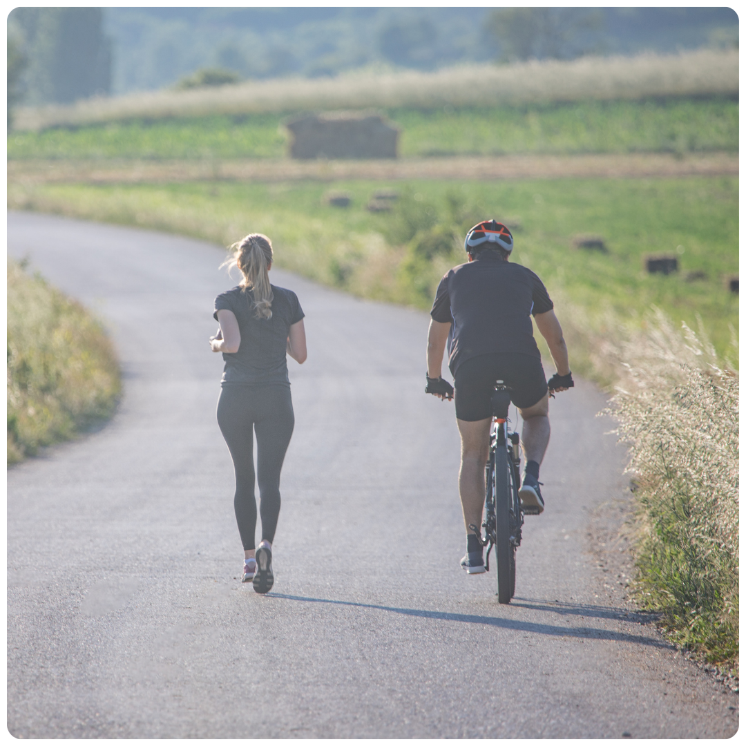Triathlon athlete riding a bike - woman riding a bike