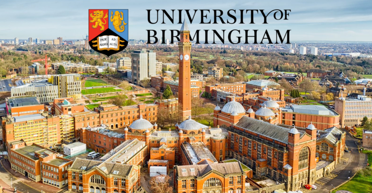 Aerial view of the University of Birmingham campus with its iconic clock tower and surrounding historic red-brick buildings.