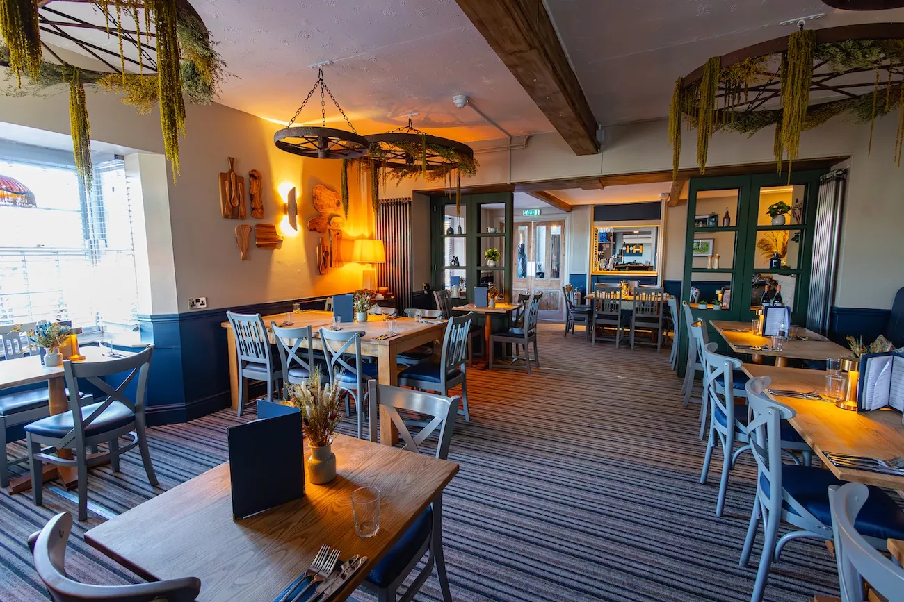 Stylish interior dining area at The Bridge Inn & Ferry, one of the top places to eat near Evesham