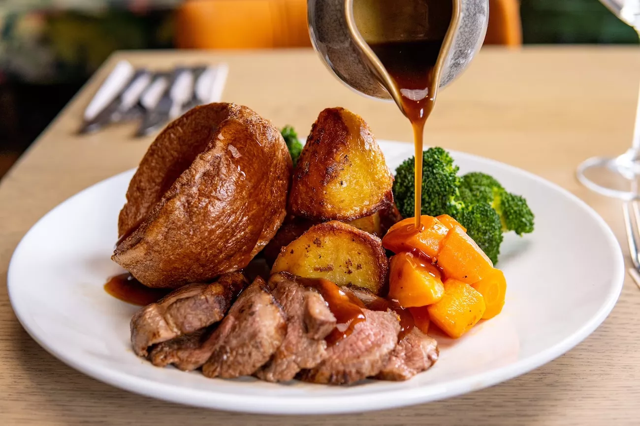 Sunday roast dinner with roast beef, Yorkshire pudding and gravy at The Bridge Inn & Ferry, Evesham