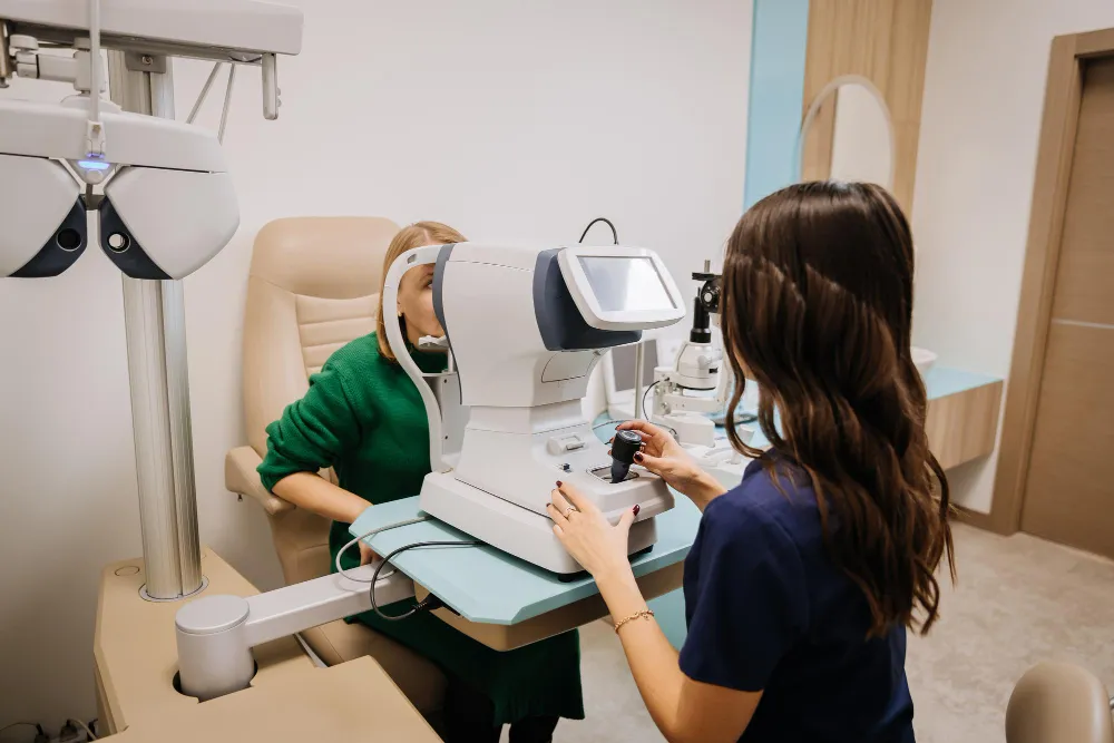 Eye exam with professional using advanced optometry equipment in medical office