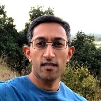 headshot of Gautam outdoors