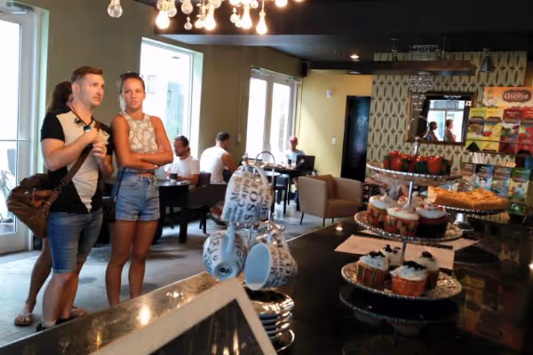 people standing in a coffee shop