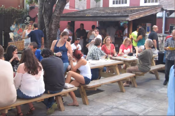 a group of people sitting on a bench