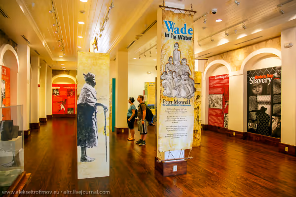 a room with a wooden floor in museum
