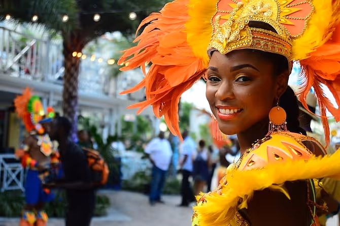 a boy wearing a yellow hat
