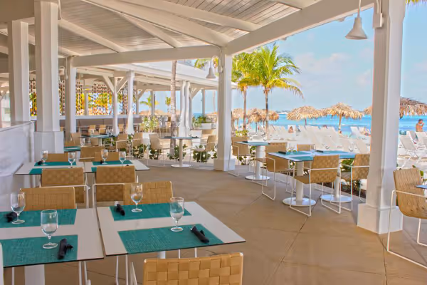 a room filled with furniture and a large window