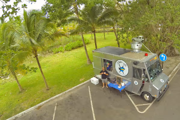 a group of people sitting at a park
