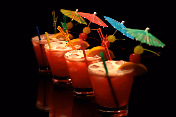 a glass of orange juice on a table