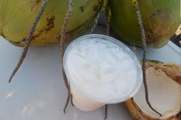 a banana and oranges on a table